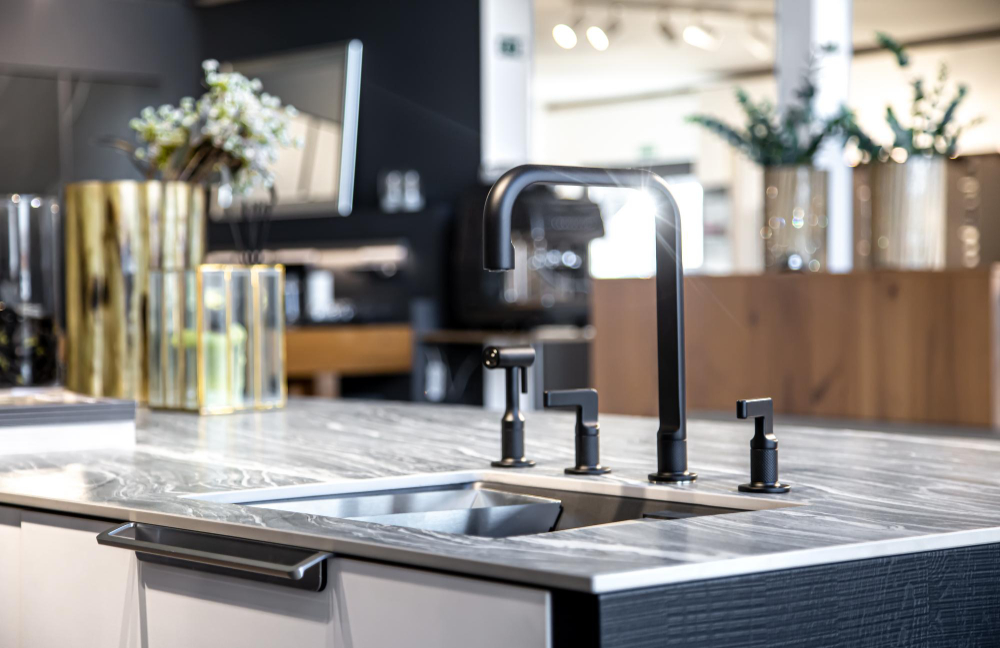 black faucet with steel sink stylish modern kitchen